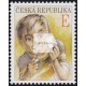 Chlapec s lupou a známkou